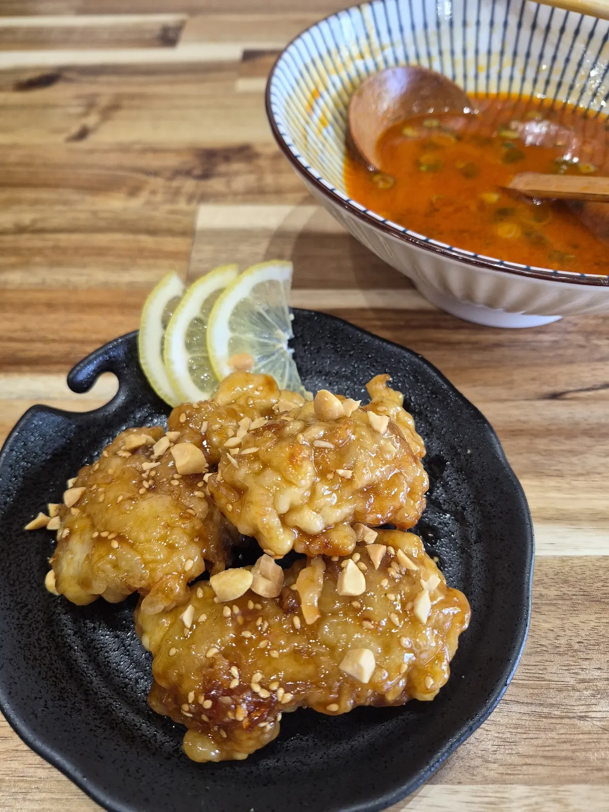Fried chicken or shrimp with lemon and a bowl of soup